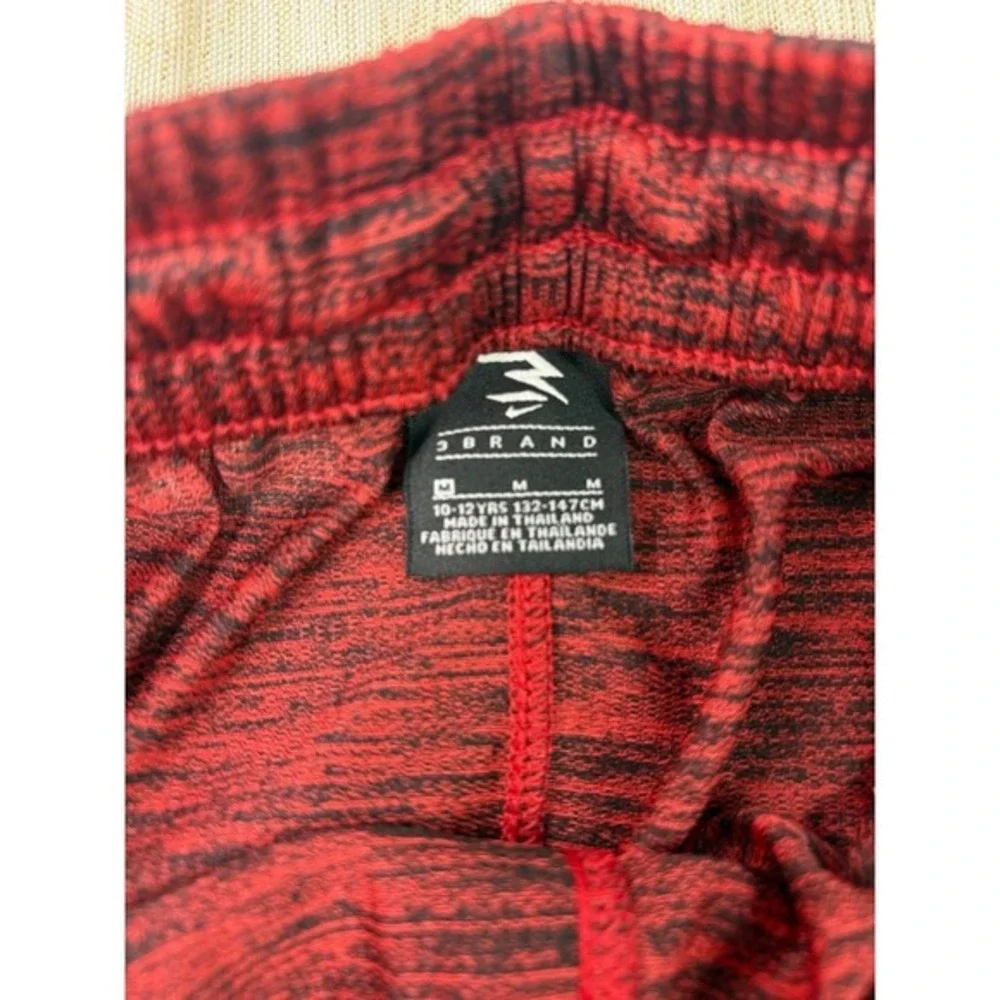 Red Nike shorts size 10-12 medium‎